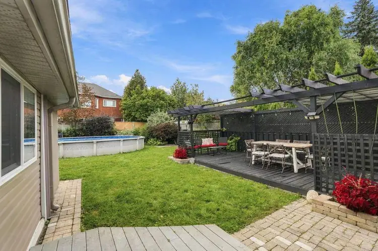 The deck, pool and rear garden